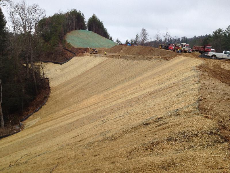 This fill slope has been seeded and stabilized in Lake Lure.
