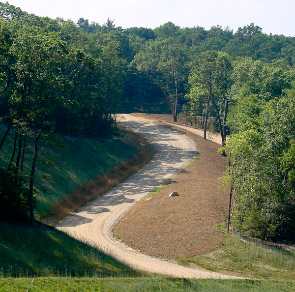 After clearing, grading and stabilization this subdivision road is ready for asphalt